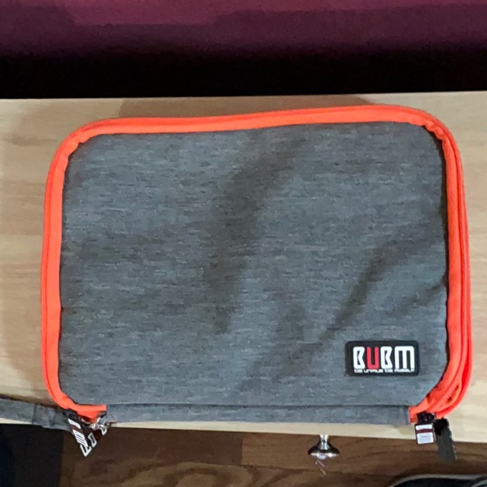 Gray and Orange double zip compartment storage bag